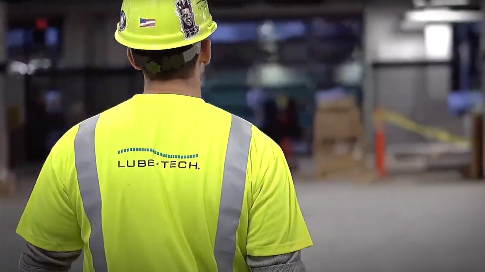 Technician with hard hat and safety vest