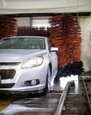 Car driving through car wash
