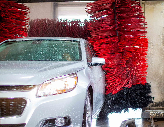 sedan inside a soft touch car wash