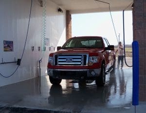 truck inside self-serve car wash
