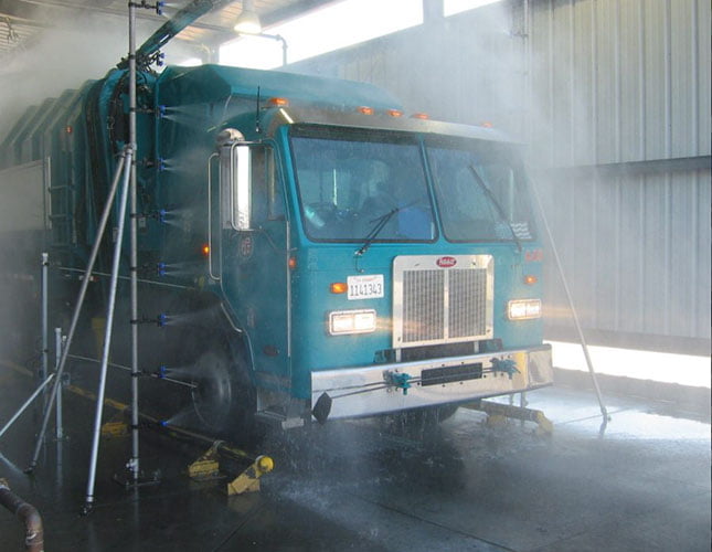 garbage truck in vehicle wash