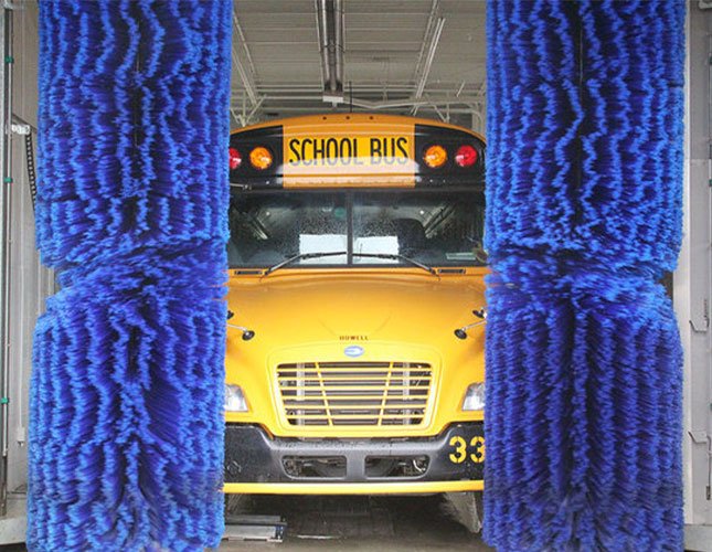school bus in vehicle wash