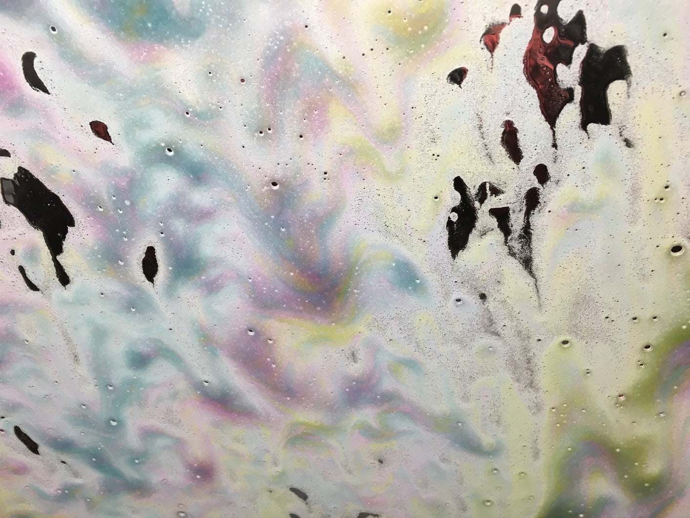 tri-color carwash foam on windshield